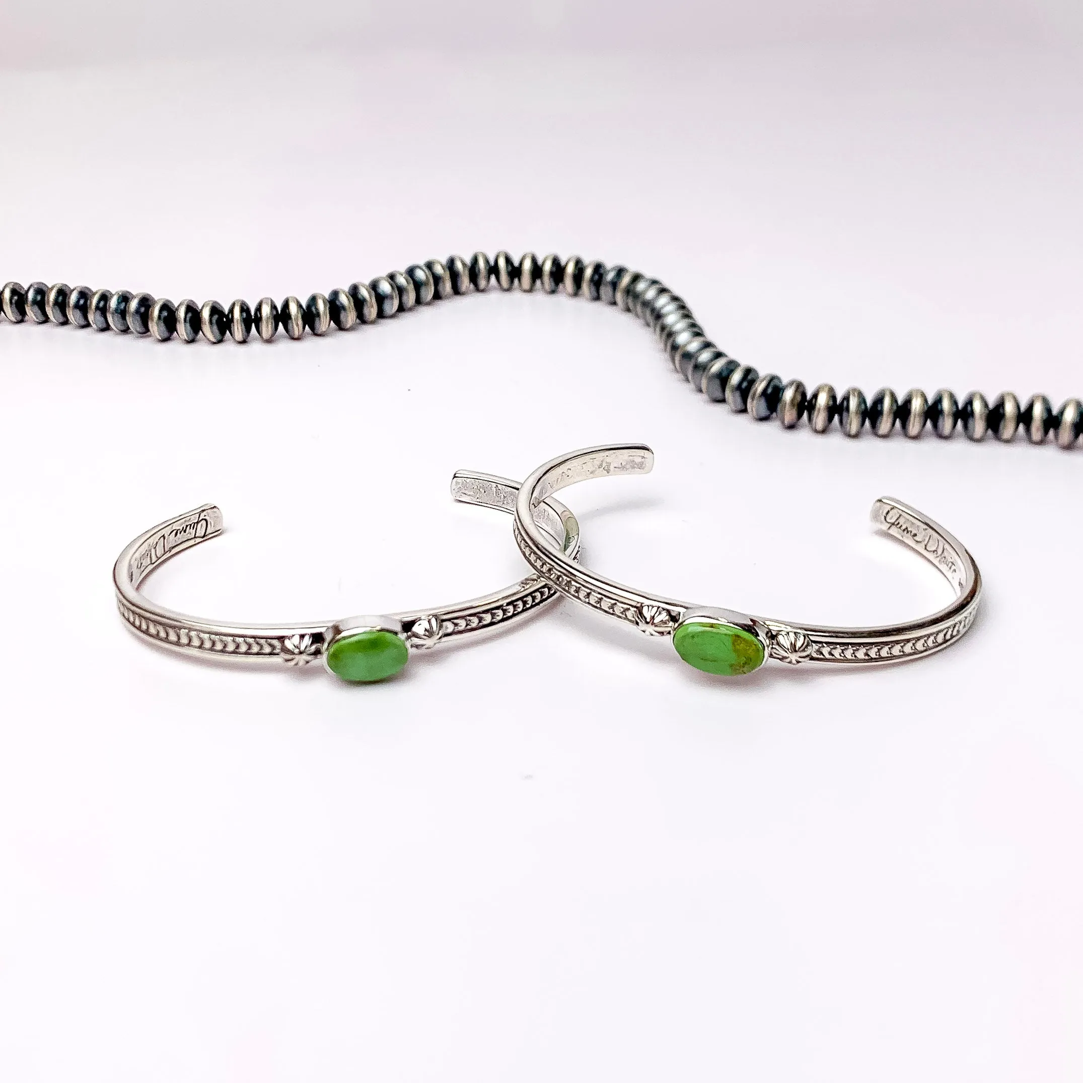 June Delauito | Navajo Handmade Sterling Silver Cuff Bracelet with a Single Green Turquoise Stone and Intricate Detailing