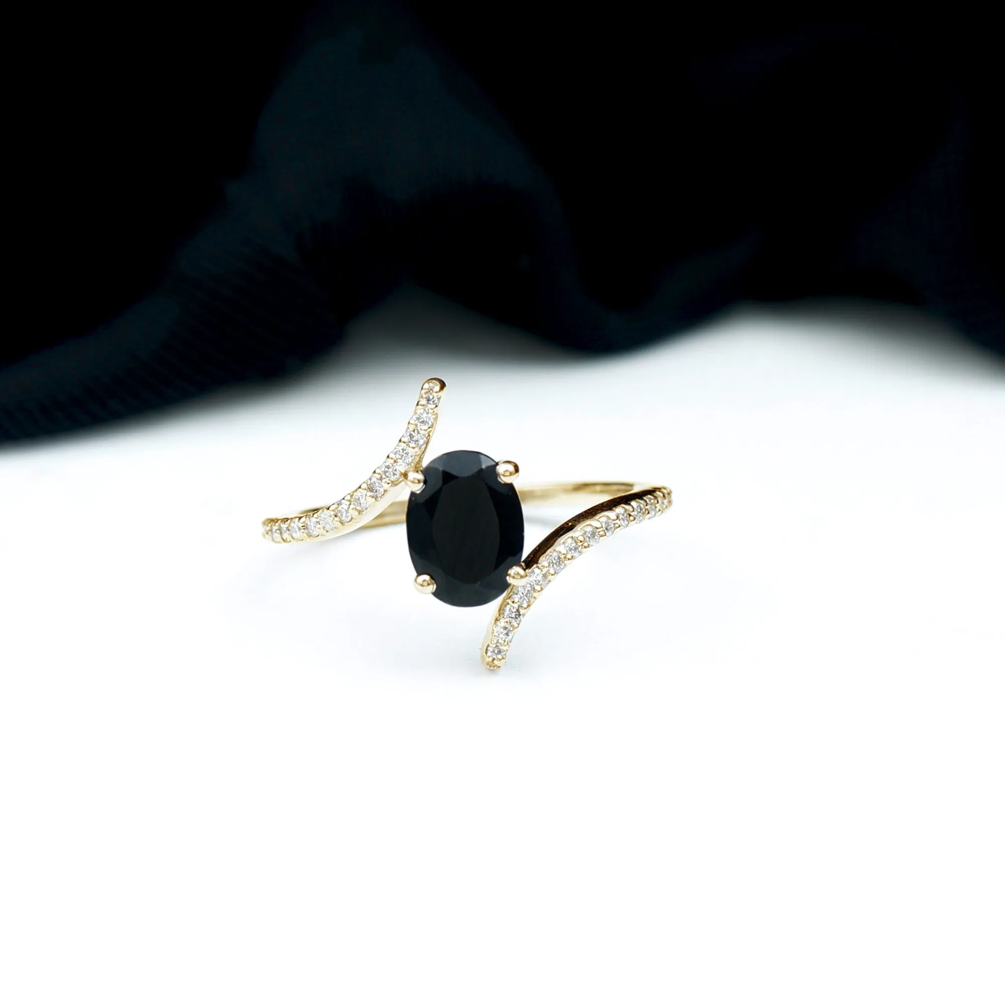 Oval Black Onyx Solitaire Bypass Engagement Ring with Diamond