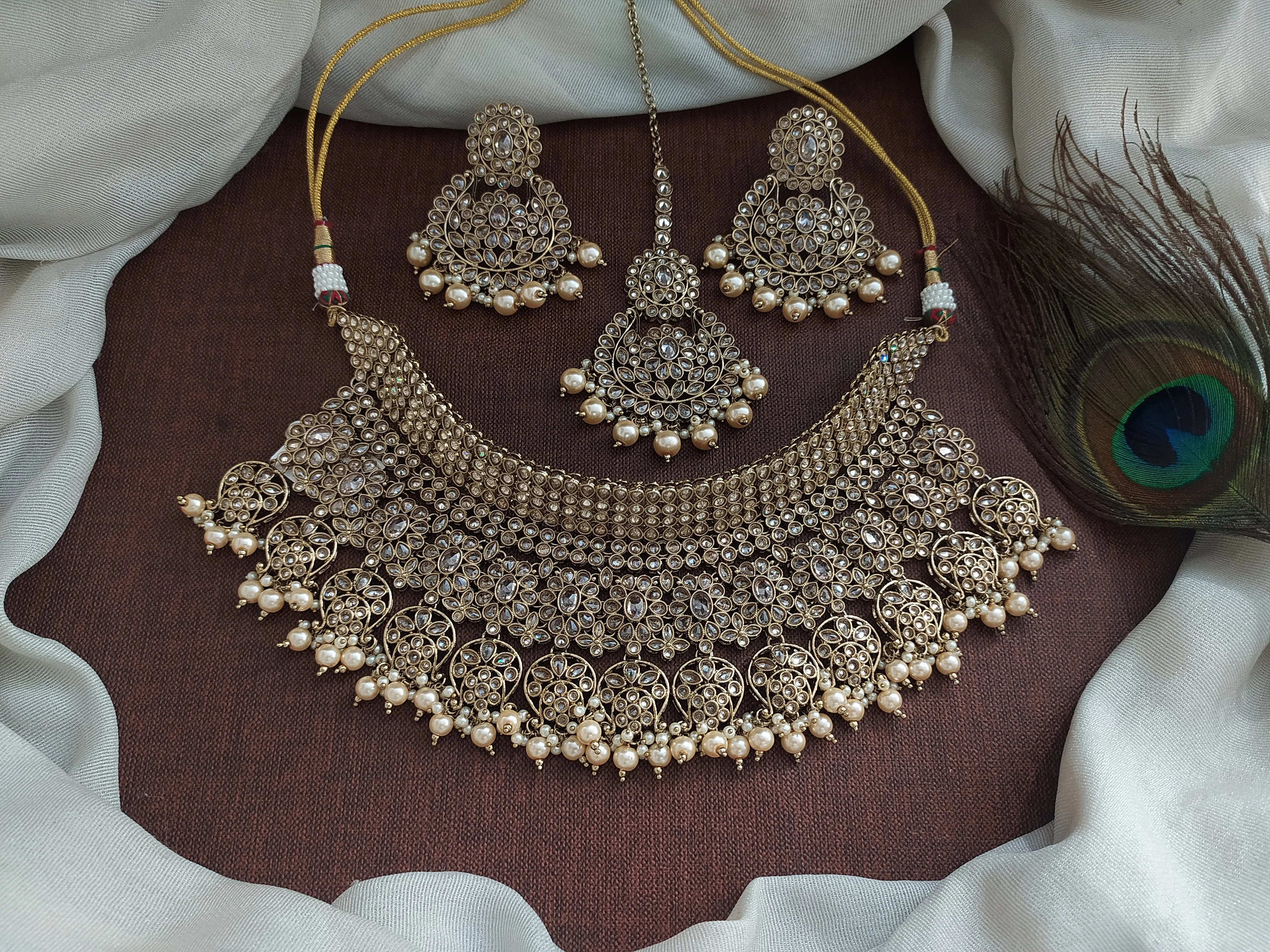 Radiate Timeless Beauty With Our Captivating Uncut Polki Bridal Choker Set