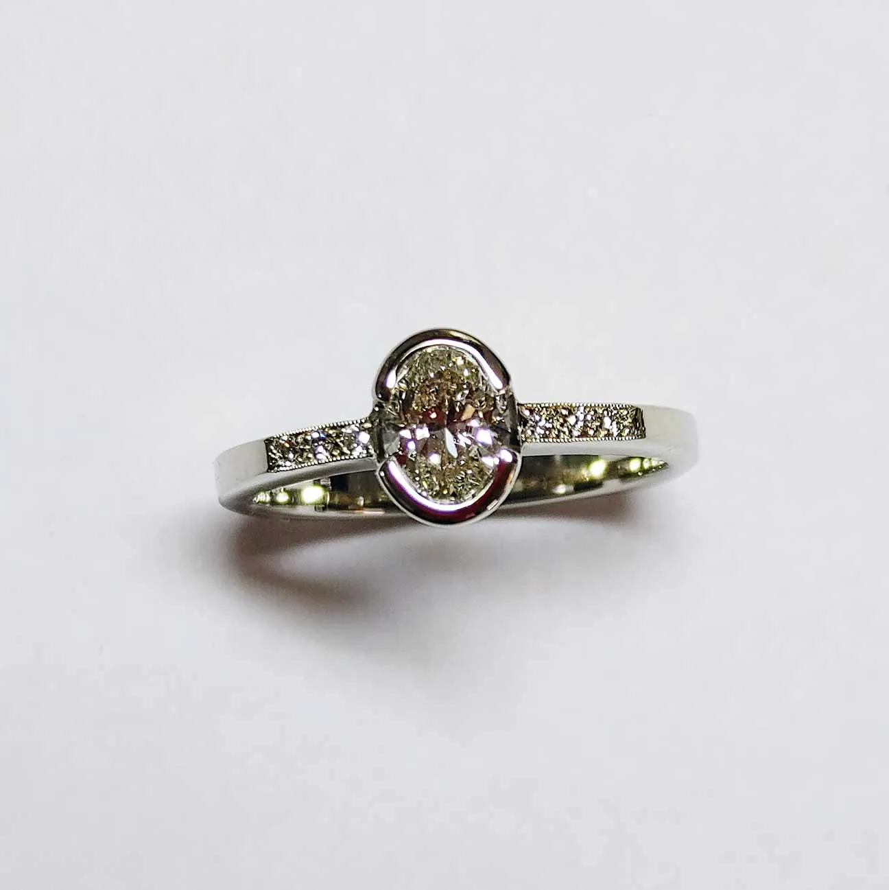 SALE-Custom Bezel Set-.69 ct. Oval Diamond Ring