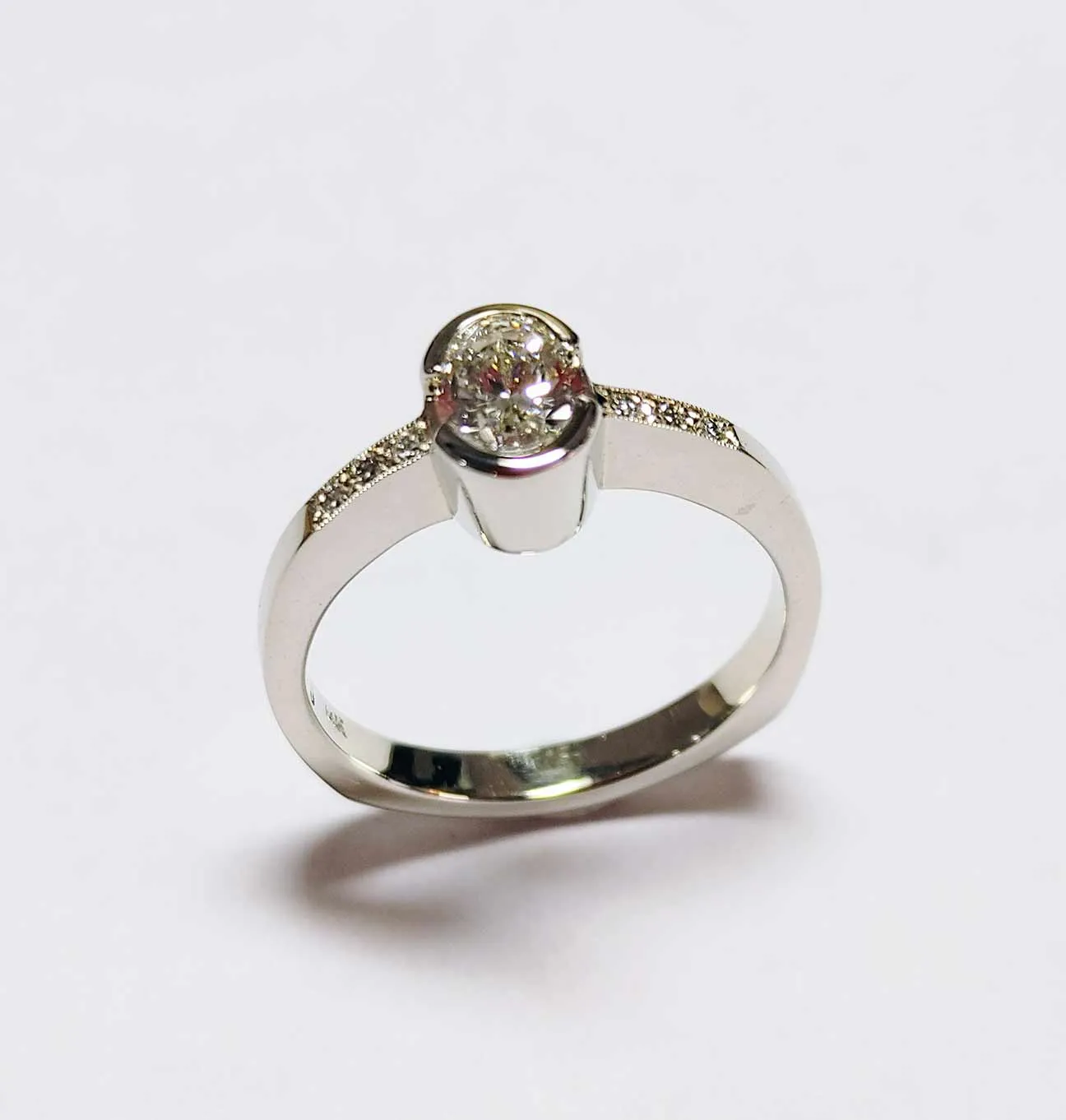 SALE-Custom Bezel Set-.69 ct. Oval Diamond Ring