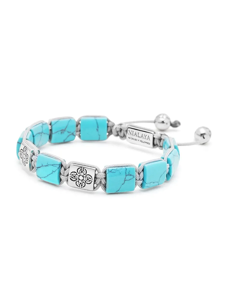 Women's Turquoise Flatbead Bracelet with Dorje Bead in Silver